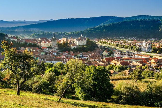 2-Day Medieval Transylvania with Brasov,Sibiu and Sighisoara Tour from Bucharest - Day One: Peles Castle, Bran Castle, and a Brasov Medieval Walk