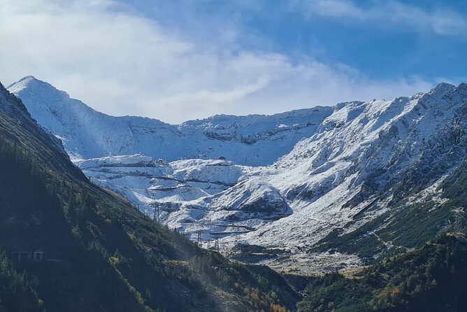 Brasov Private Tour: Transfagarasan road & Poienari Fortress - Vidraru Dam: quick stop, strong mountain-engineering vibe