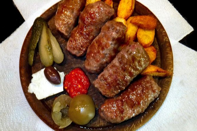 Bucharest: Dinner at the Museum of Communism & tour after closing - Dinner in the museum living room: Romanian food served as part of the lesson