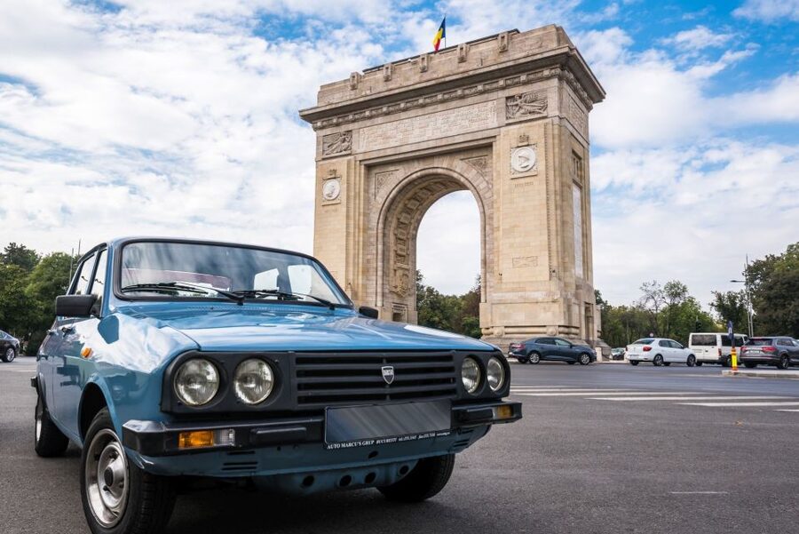 Bucharest: Private Communist Tour in a Romanian Vintage Car - First leg: Revolution Square and the power symbols you can see fast
