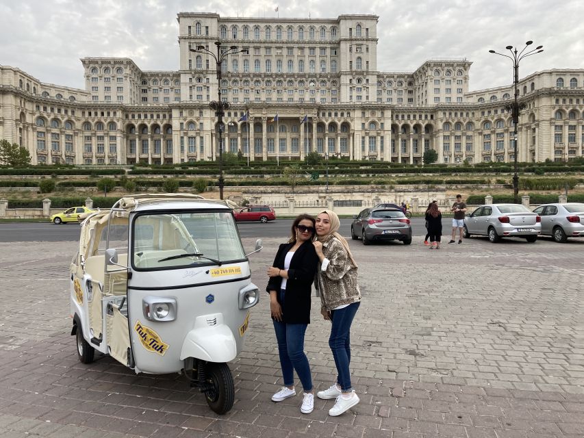 Bucharest: Romantic Tuk Tuk Tour with miniBAR - Triumphal Arch and Revolution Square: big civic landmarks in a compact loop