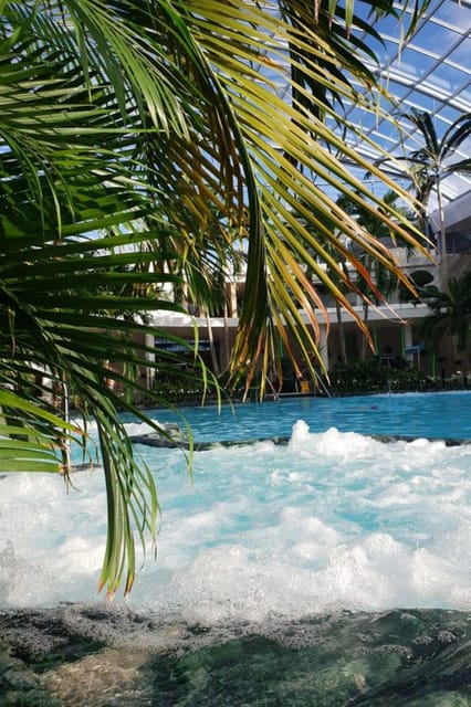 Bucharest: Therme Night Show Ticket with Transfer - Therme at night: glowing water and the real reason to go