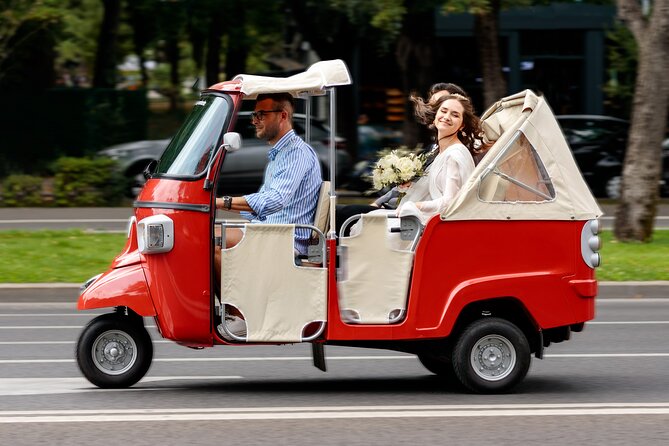 Bucharest Tuk Tuk city tour - House of the Free Press: communist publishing, then a name change