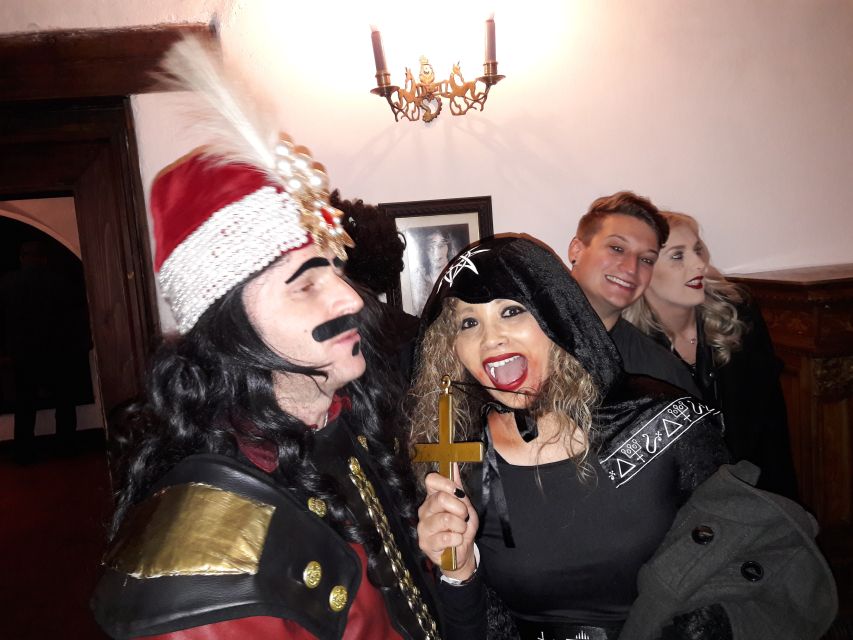 From Brasov: Halloween Party at Bran Castle - The welcome in Bran: red wine, palinca, and pre-party snacks