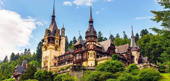 One Day Private Tour to Peles and Dracula Castles & Brasov City - Peles Castle: royal rooms, marble detail, and the staircase moment