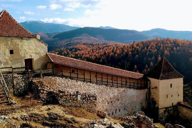 Peles Castle, Bran Castle, Rasnov Fortress and Sinaia Monastery Tour from Brasov - Bran Castle, Draculas Castle: Lines, Views, and the Story Behind the Rock