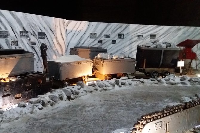 Salt Mine, the Muddy Volcanoes and Wine Tasting Private Day Tour from Bucharest! - Unirea Salt Mine: 208 meters down, inside a 54-meter hall