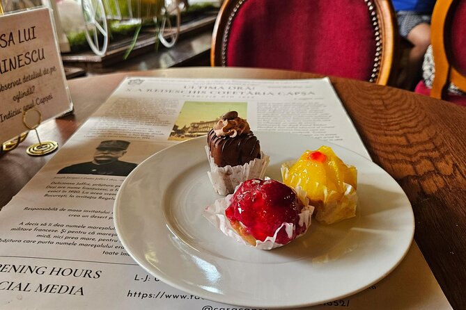Sweet Delights History and Desserts Walking Tour in Bucharest - Stop 1 at Ateneul Roman: monarchy vibes plus your first bite