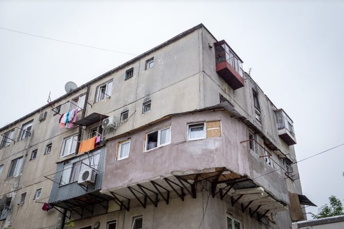 Troubled - Notorious Neighborhood - area known for social issues - Ferentari: Street-level Bucharest, with markets and everyday motion